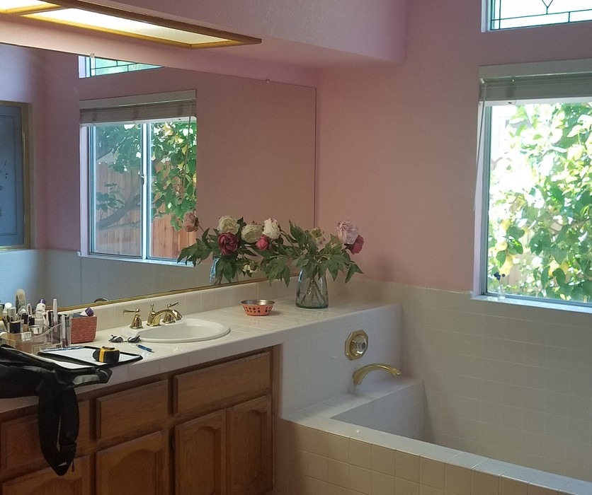 Dated pink master bathroom before remodeling