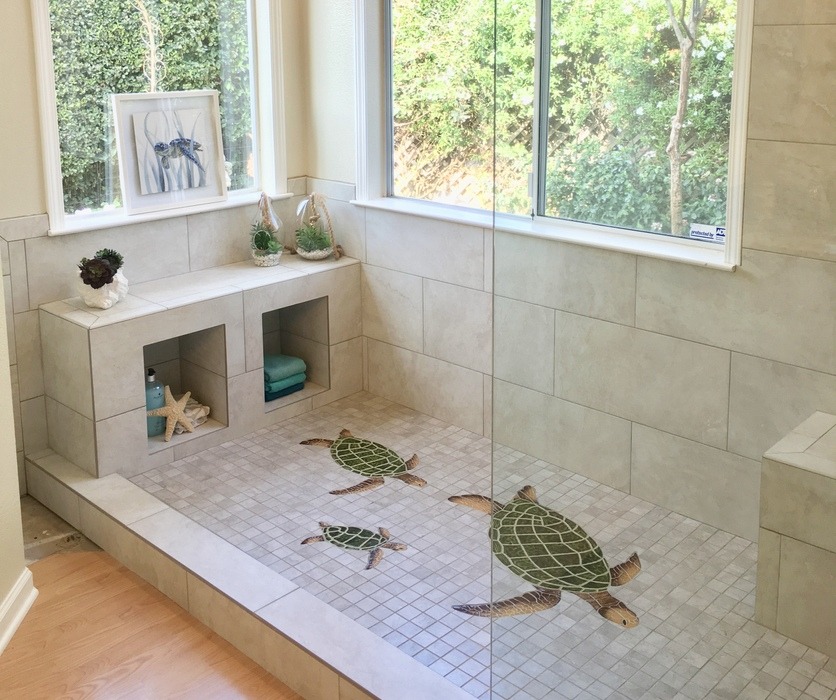 Custom tile walk-in shower with bench seating