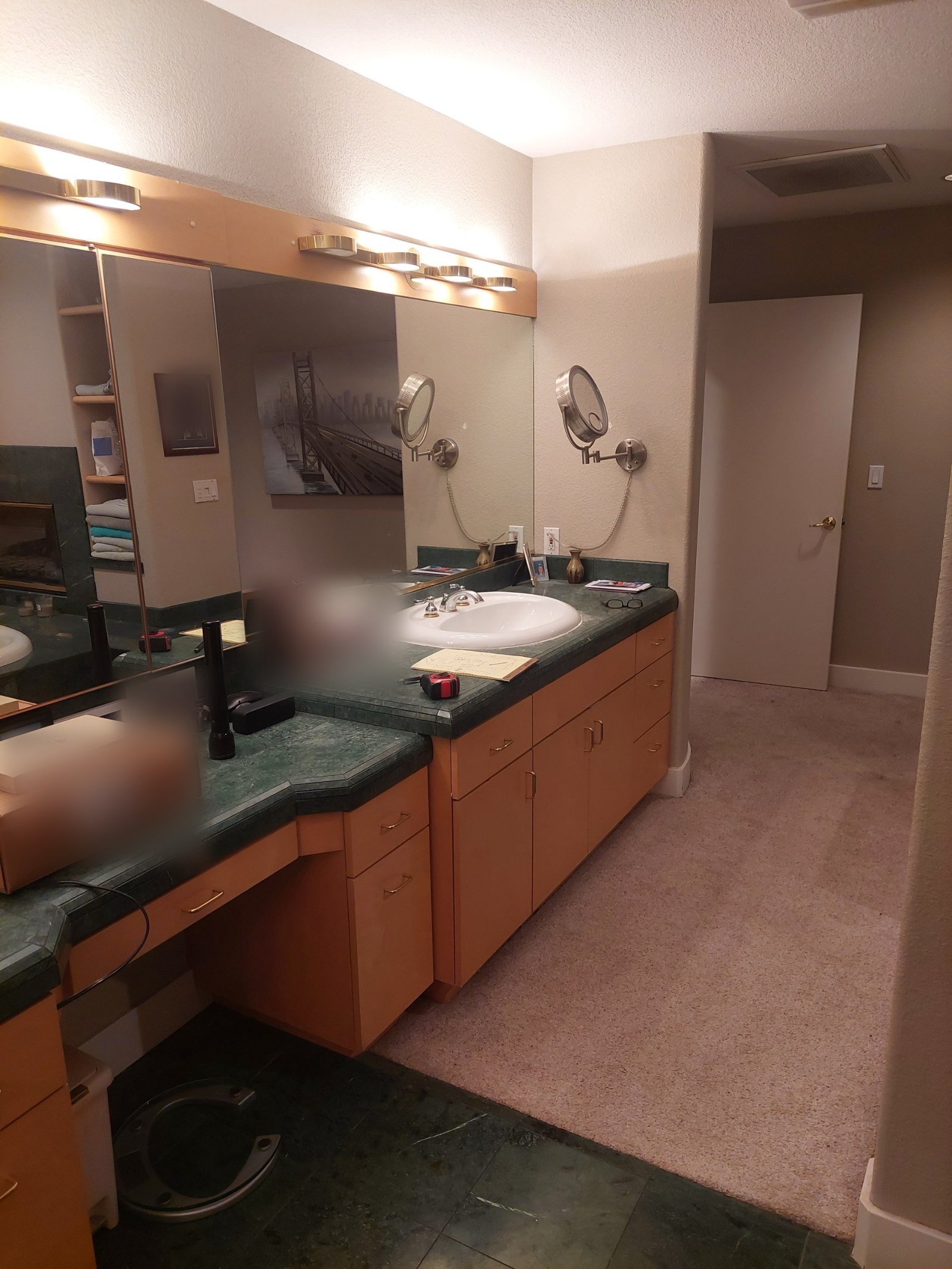 Original maple vanity with green marble counters and carpeted bathroom floor